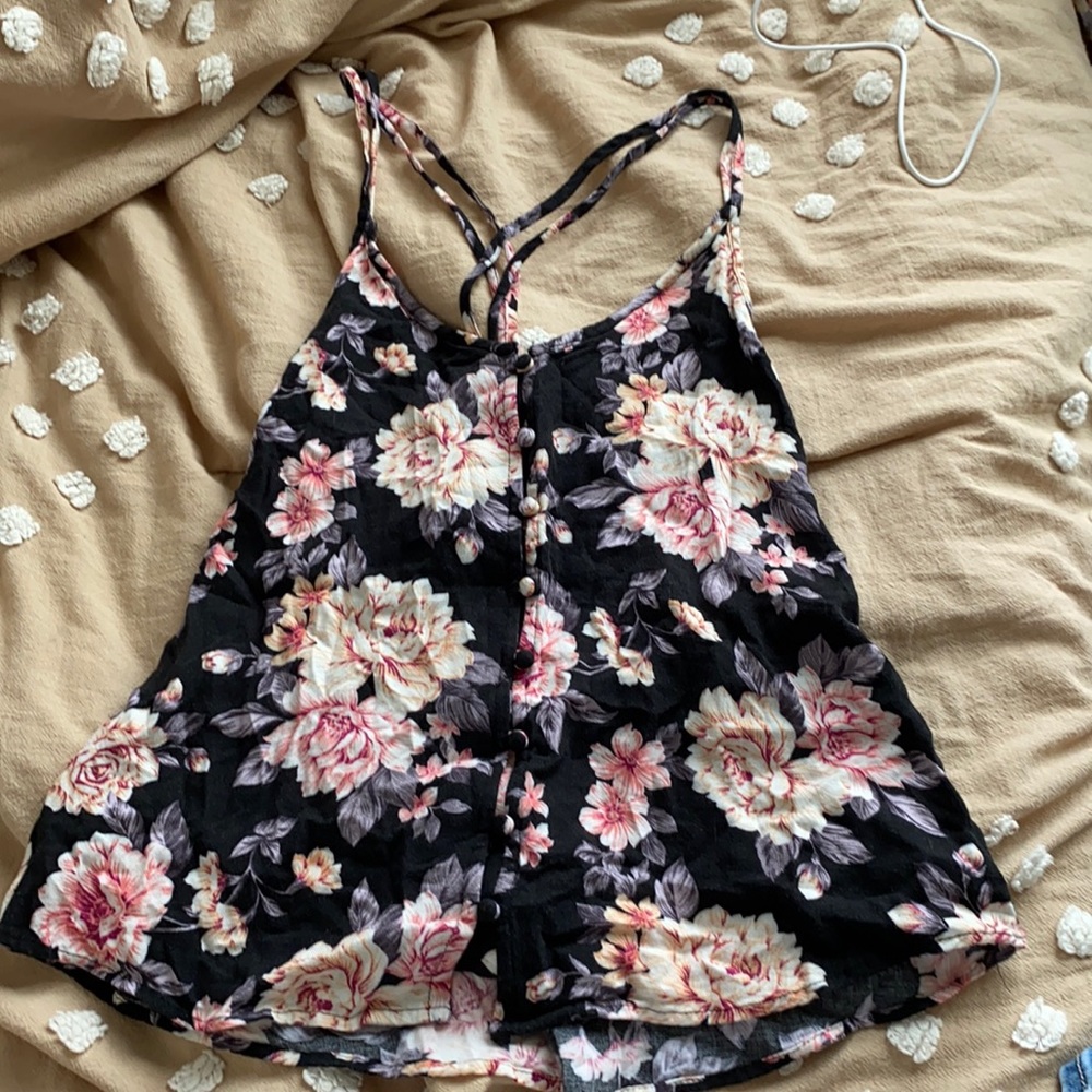 Black flowered tank top with crossed back straps